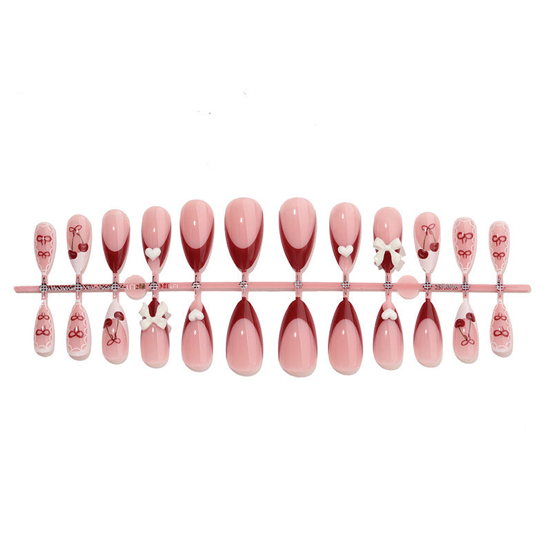 Fake nail set with playful motifs and elegant accents Bowlift