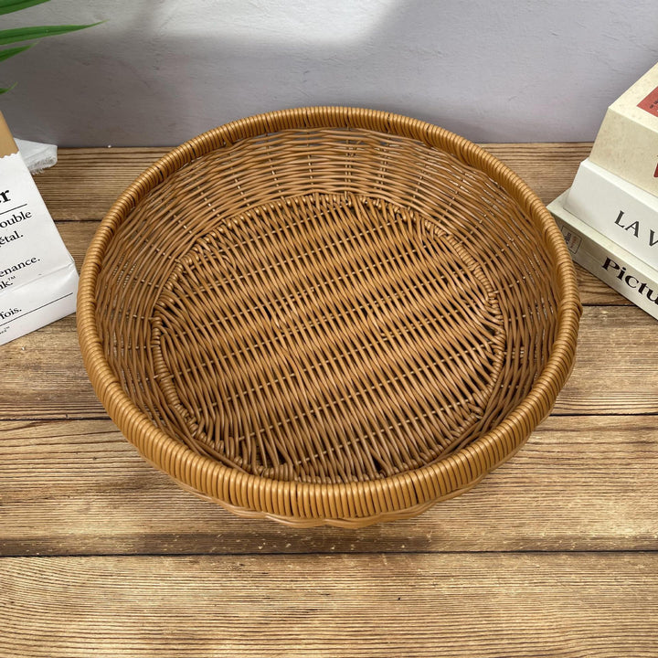 Women’s round serving basket made of woven rattan Bowlift