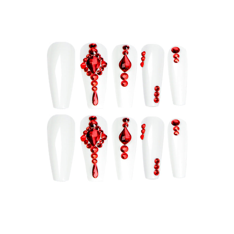 Artful nail extensions with glitter accents and elegant embellishments Bowlift