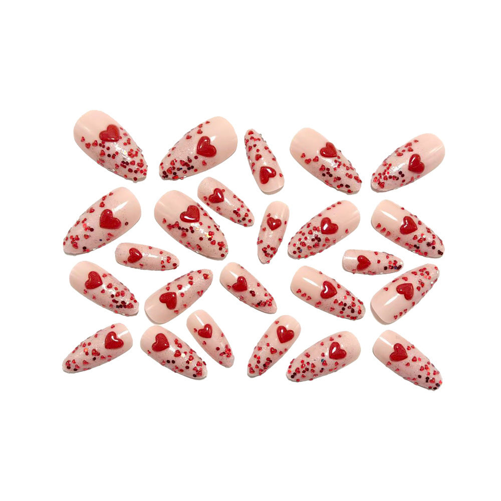 Glamorous artificial nails with heart design and glitter Bowlift