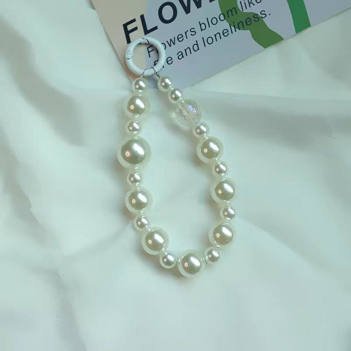 Elegant Pearl and Black Bead Charm Bracelet Bowlift