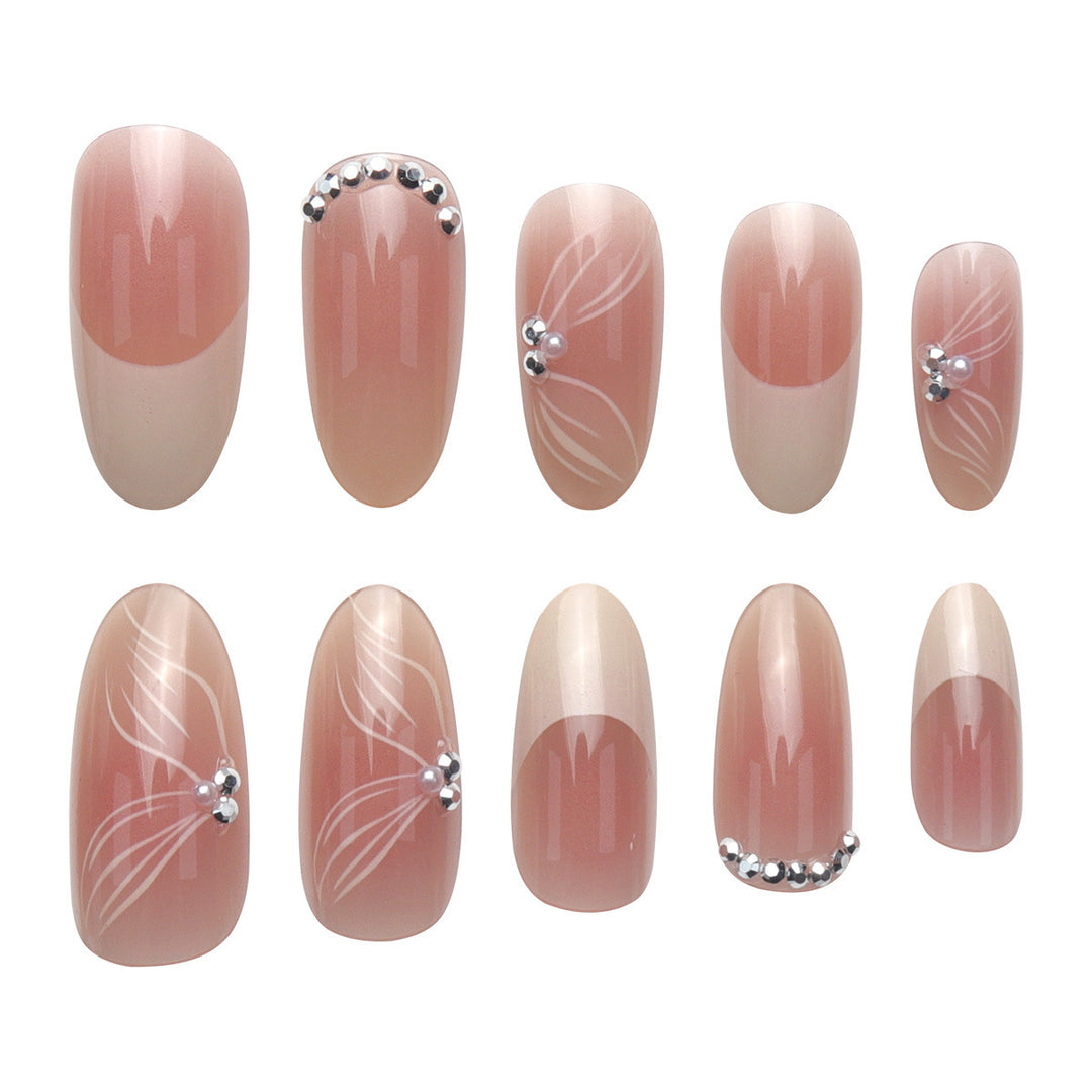 Elegant Long Stiletto Press-On Nails with Floral and Gem Accents Bowlift