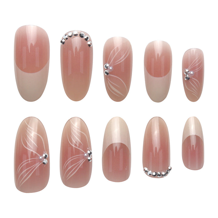 Elegant Long Stiletto Press-On Nails with Floral and Gem Accents Bowlift
