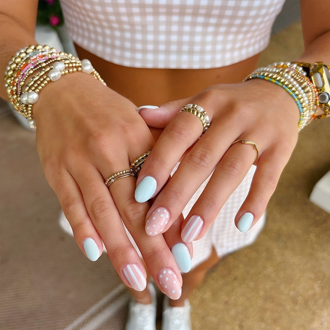 Creative Nail Art with Dots and Stripes Bowlift