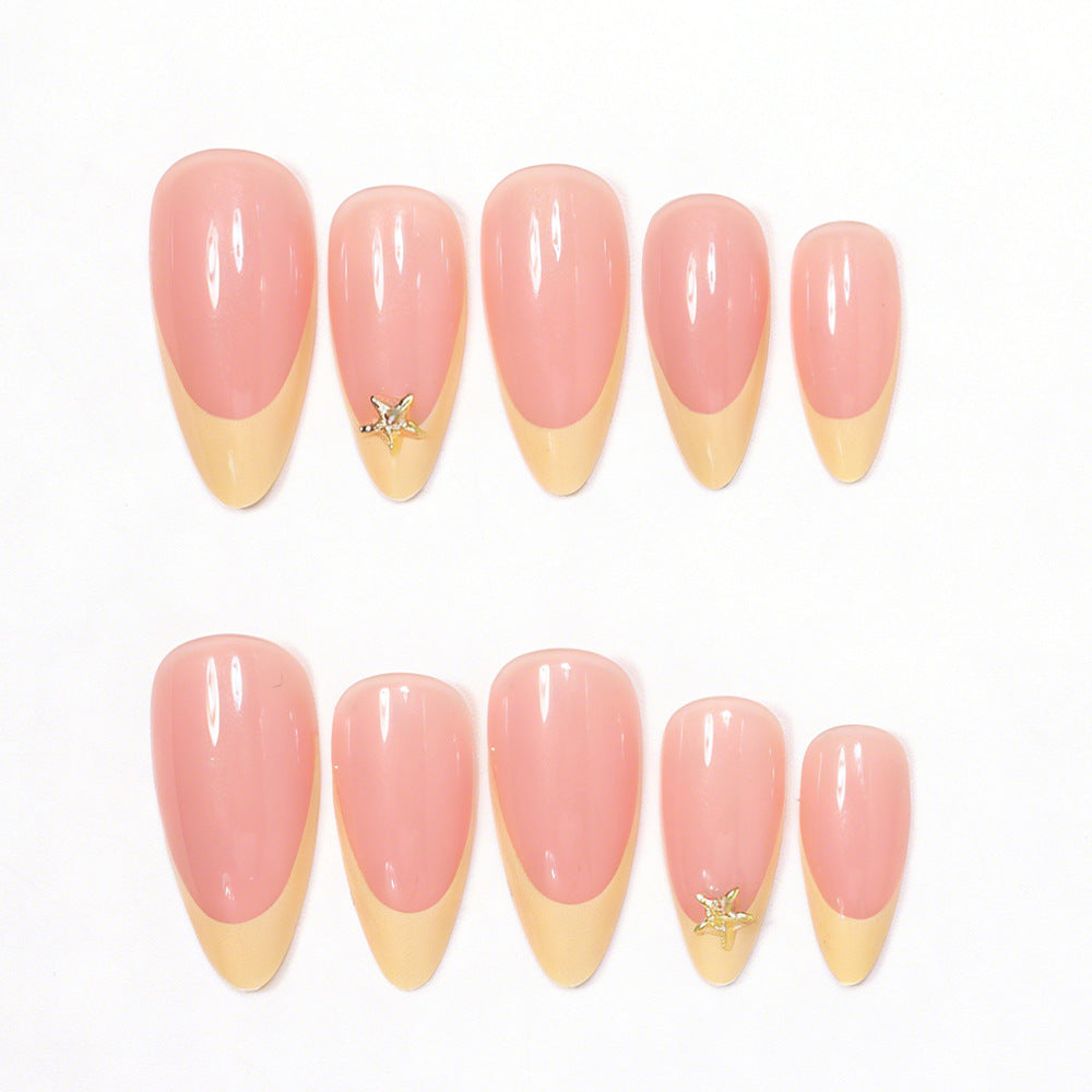 Elegant Stiletto Nail Art Tips with Starfish Accents Bowlift