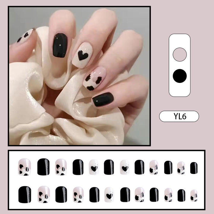 Creative nail art with heart and animal motifs Bowlift