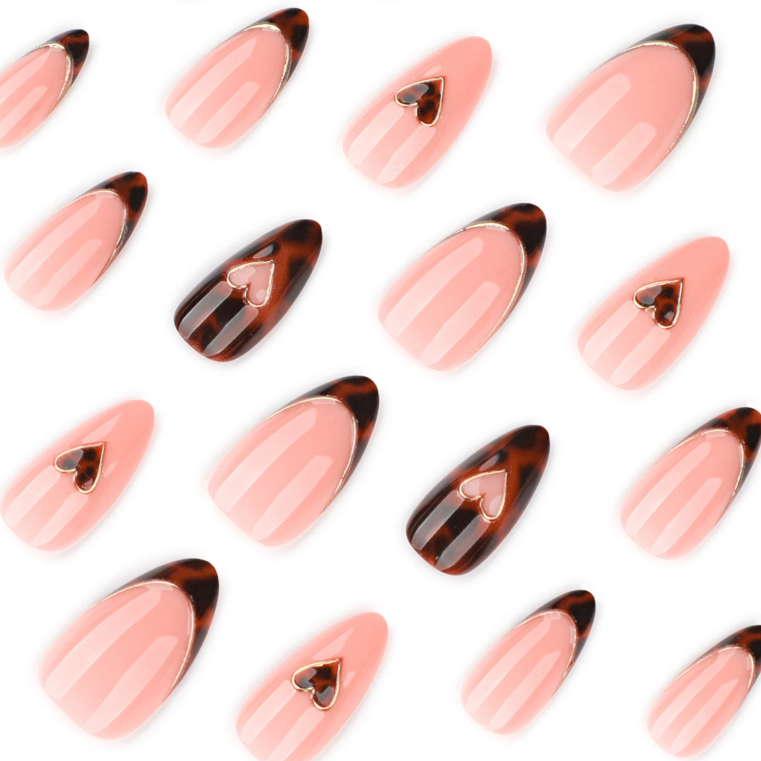 Artful stiletto nails with elegant heart design Bowlift
