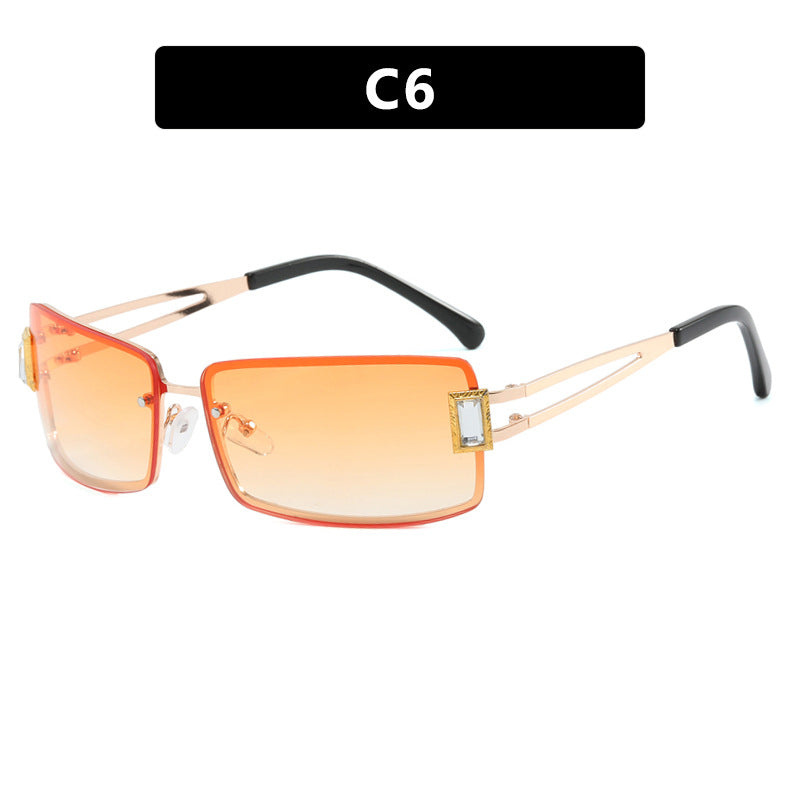 Ladies stylish sunglasses with elegant trapezoidal lenses and filigree metal frame Bowlift