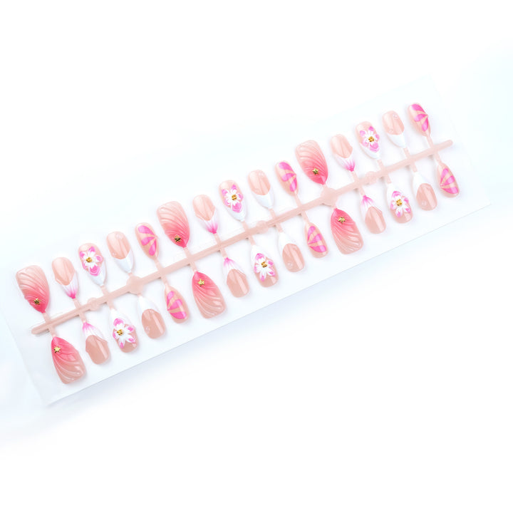 Artificial nail set with floral and elegant accents Bowlift