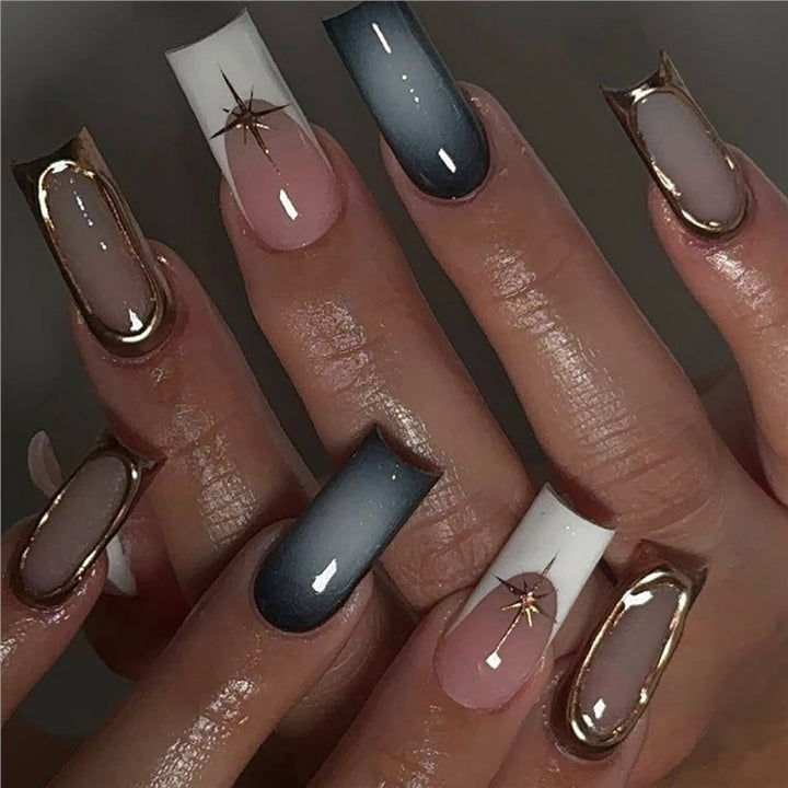 Elegant Stiletto Nail Extensions with Golden Accents Bowlift