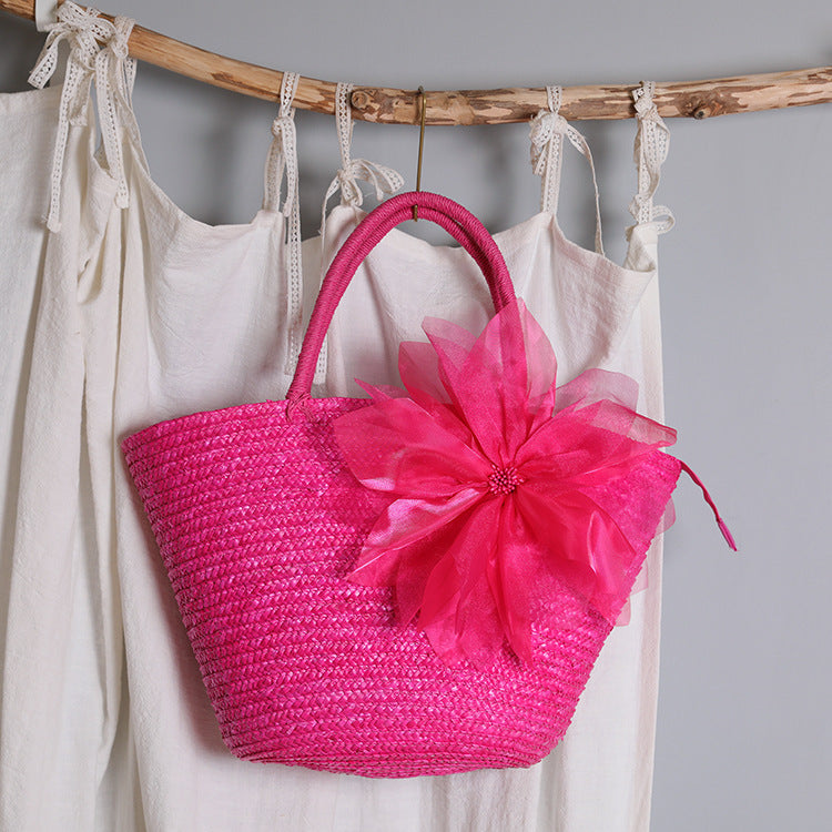 Stylish basket bag with eye-catching flower detail Bowlift