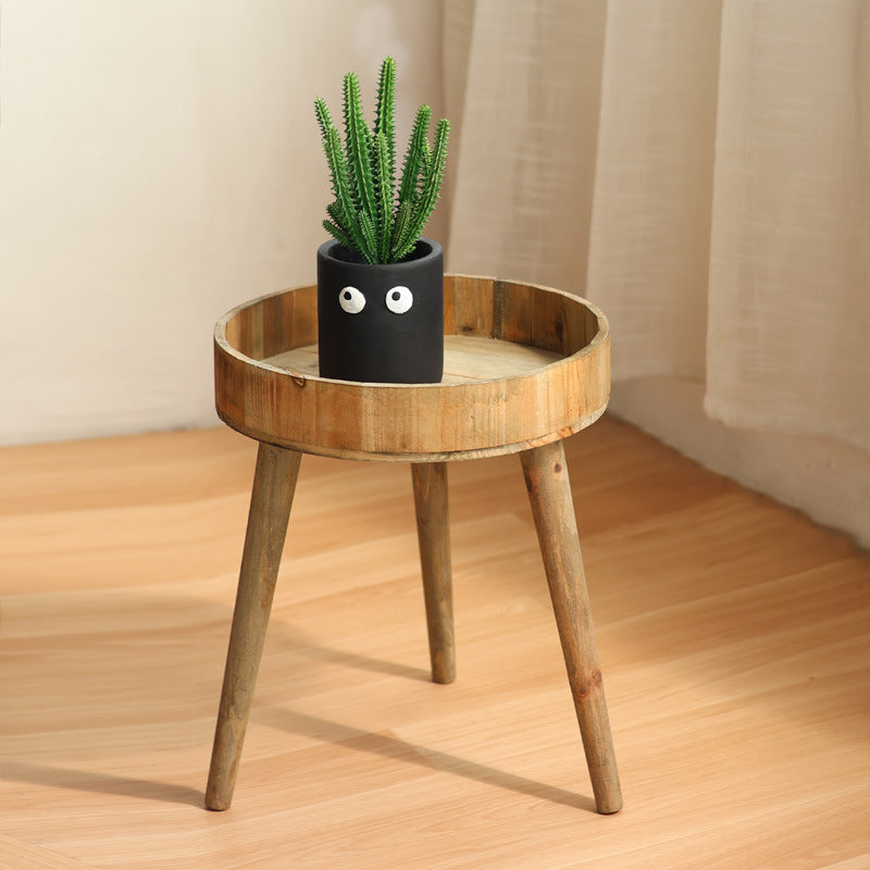 Modern side table made of wood Bowlift