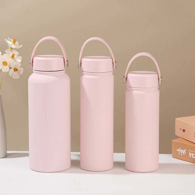 Women's insulated water bottle with ergonomic carrying handle Bowlift