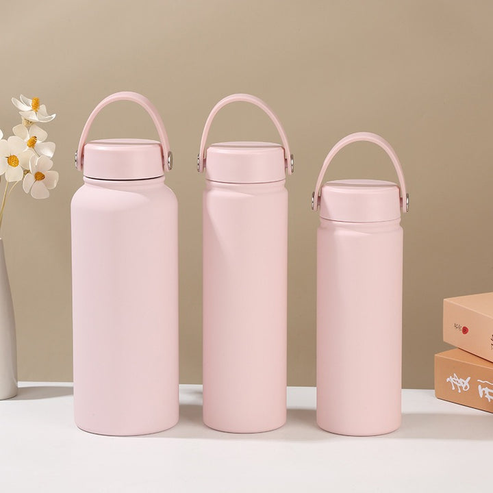 Women's insulated water bottle with ergonomic carrying handle Bowlift