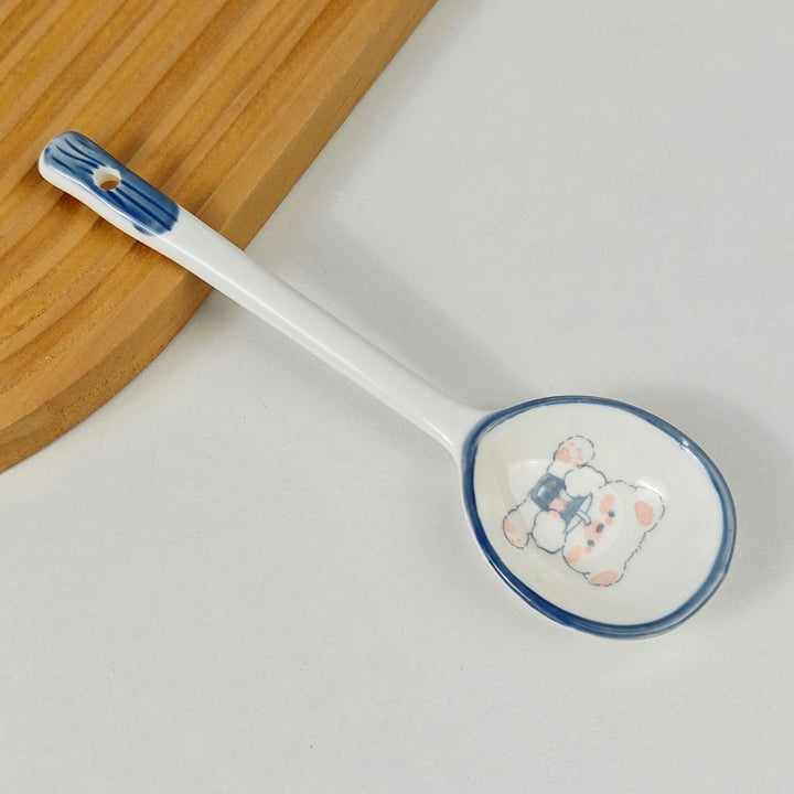 Ceramic soup spoon with lucky cat illustration and ergonomic long-handle Bowlift