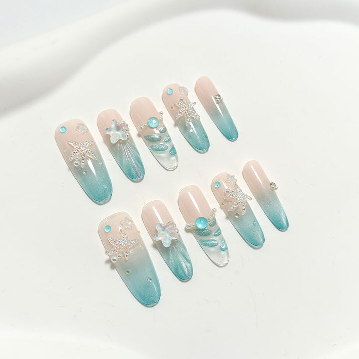 Elegant Nail Art with Ocean Theme and 3D Accents Bowlift