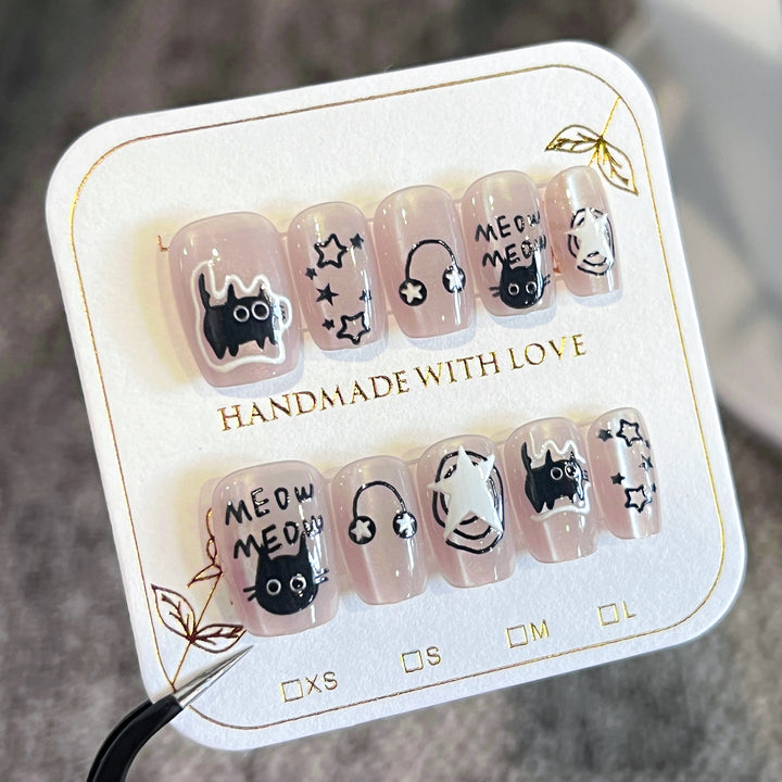 Artificial nail art with cat designs Bowlift