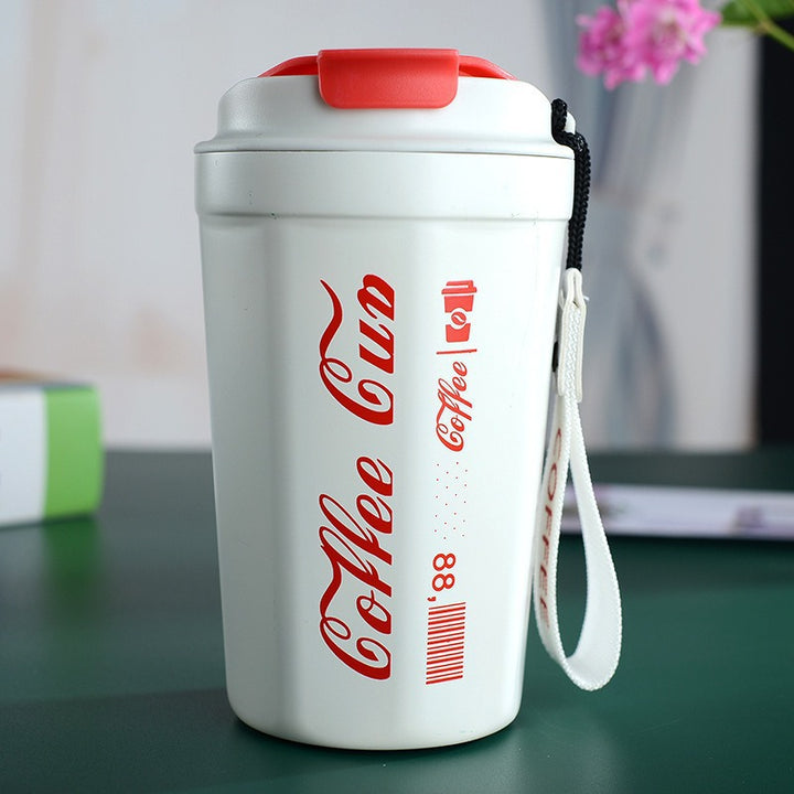Women's insulated coffee cup with practical carrying device Bowlift