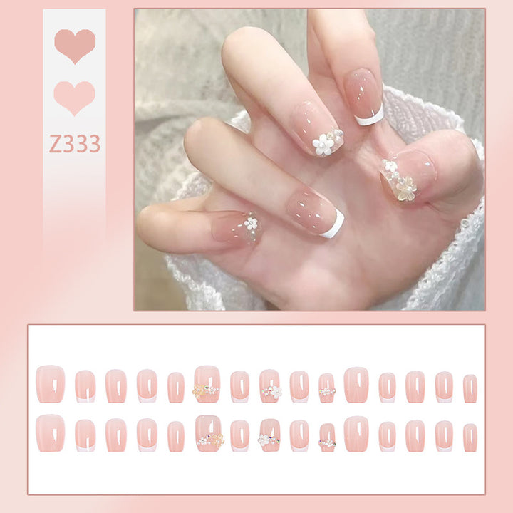 Nail set with elegant flower appliqués and exquisite glitter embellishments Bowlift