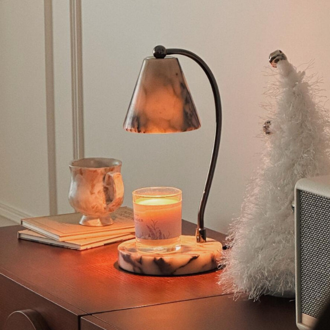 Marble bedside lamp with integrated candle tray and curved metal arm Bowlift