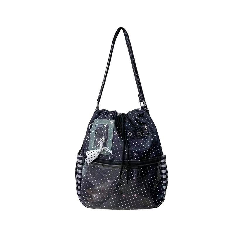 Shoulder bag with practical compartments and playful design Bowlift