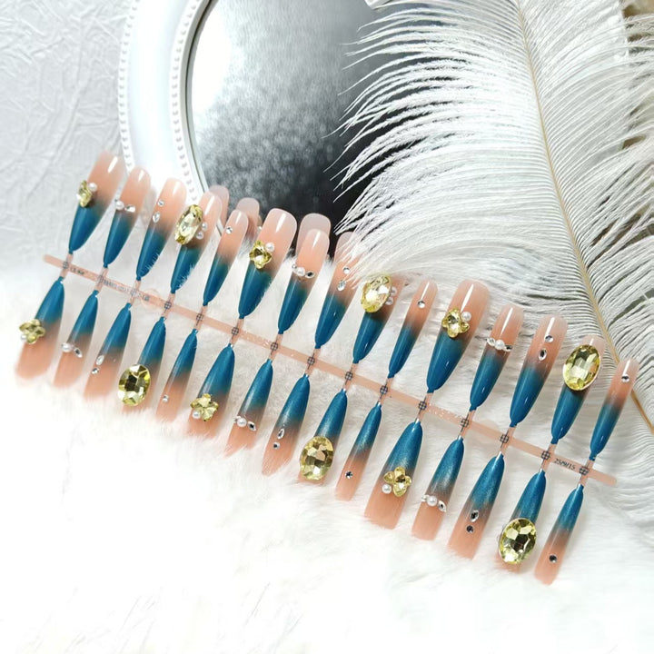 Artificial Nails in Elegant Stiletto Style with Sparkling Accents Bowlift