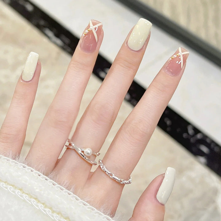Acrylic nail set with elegant and playful design Bowlift