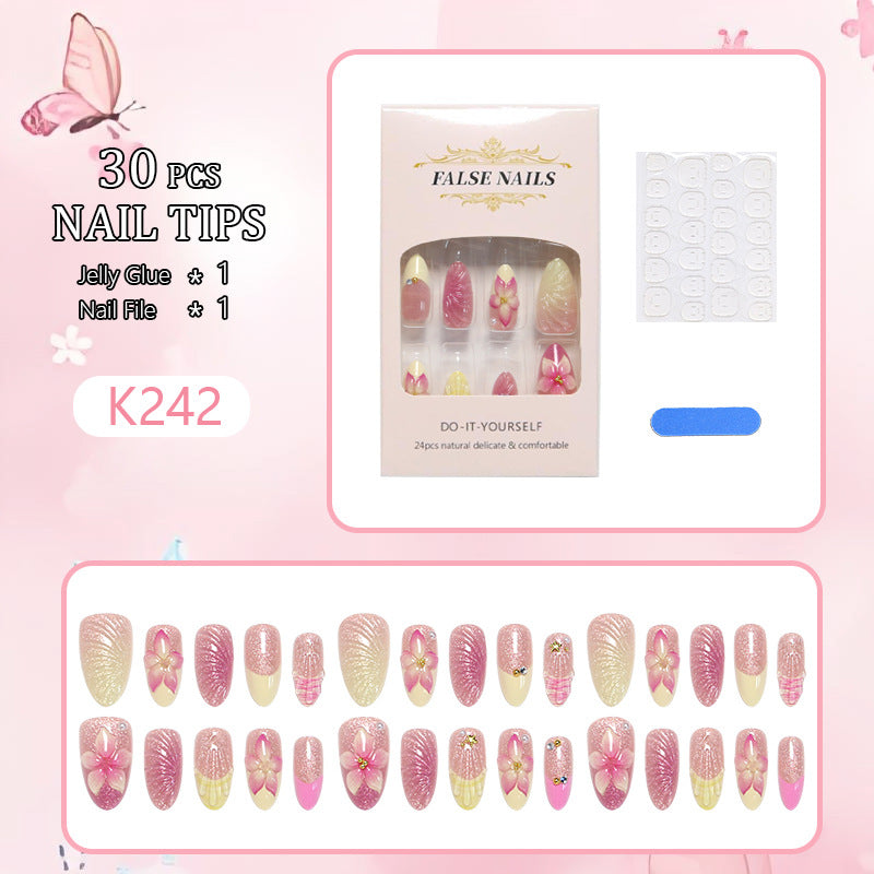 Artificial nail set with floral 3D decorations Bowlift