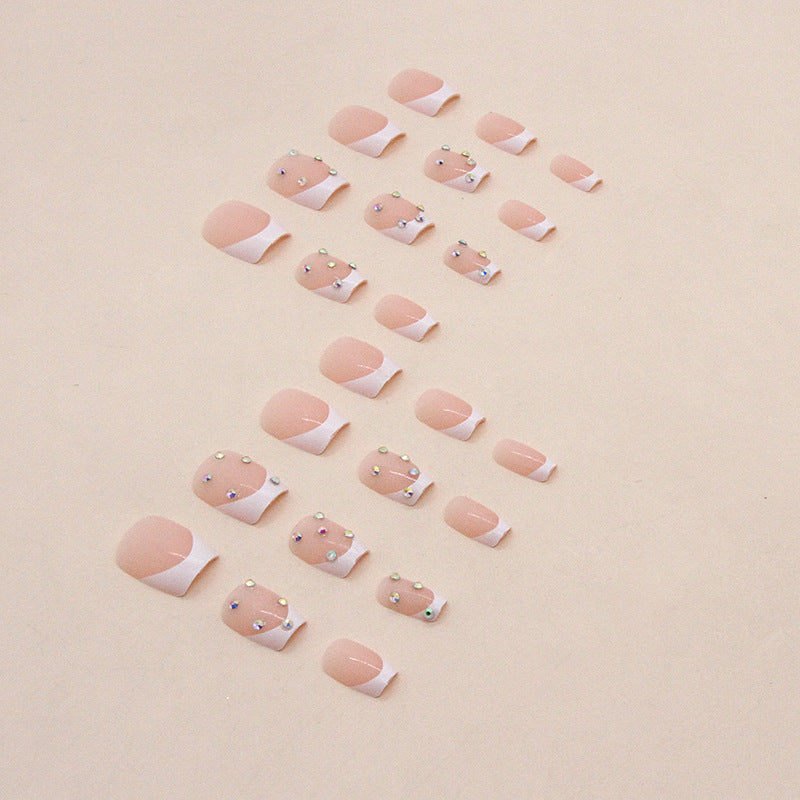 Elegant Rhinestone French Tip Nail Art Bowlift