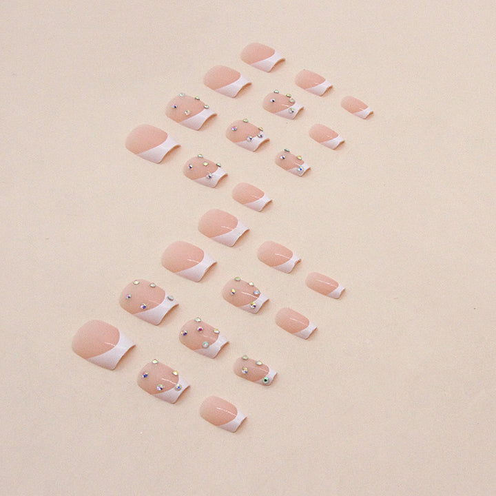 Elegant Rhinestone French Tip Nail Art Bowlift