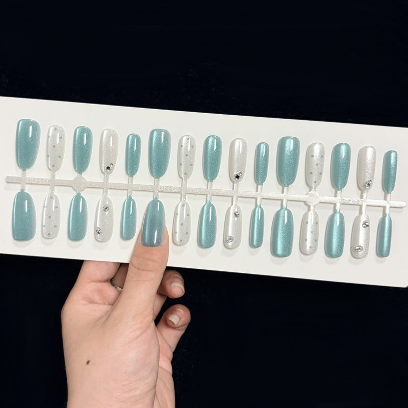 Artistic Press-On Nail Design with 3D Accents Bowlift