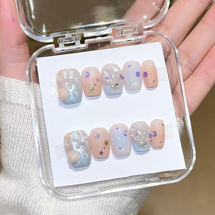 Artificial nails with sparkling galaxy design Bowlift