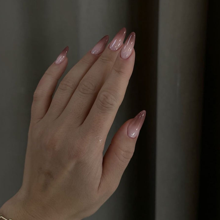 Artistic stiletto nails with elegant ombre design Bowlift