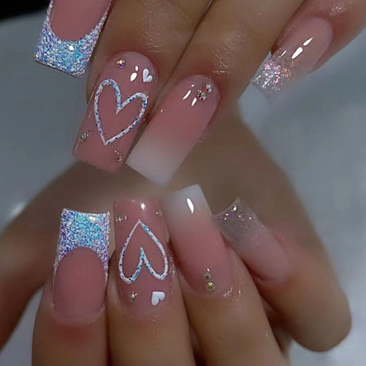 Artificial nail set with sparkling heart and glitter motifs Bowlift