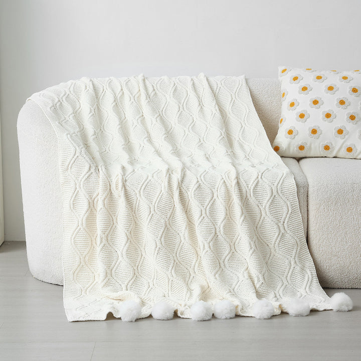 Ladies knit blanket with decorative pom poms Bowlift