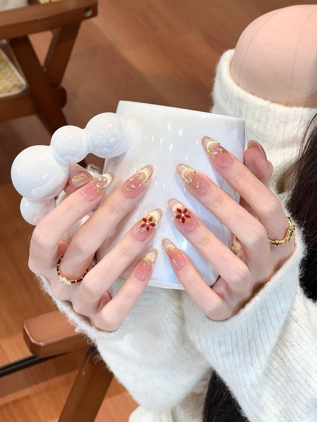 Elegant artificial nails with sparkling floral decorations Bowlift