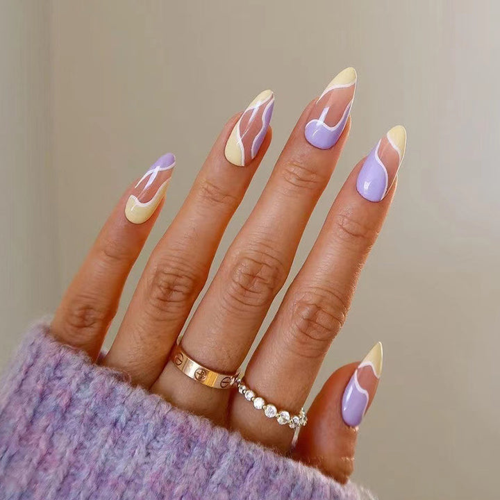 Artful Nail Extensions with Wave Design and Colorful Accents Bowlift