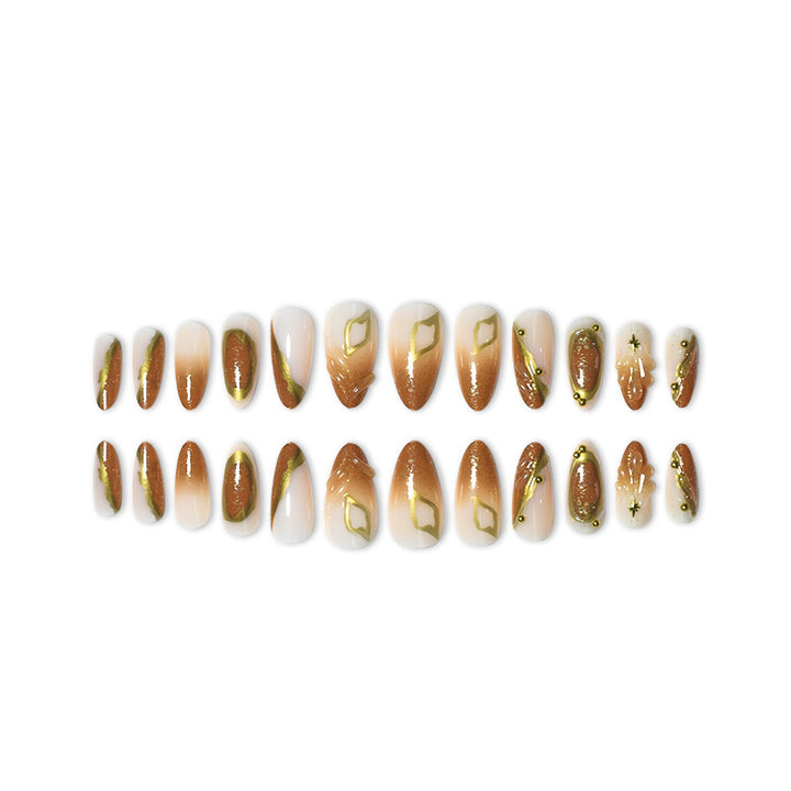 Luxurious Press-On Nail Set with Ornate Gold Detailing Bowlift