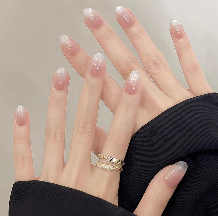 Artificial nails with elegant ombre effect and glitter accents Bowlift