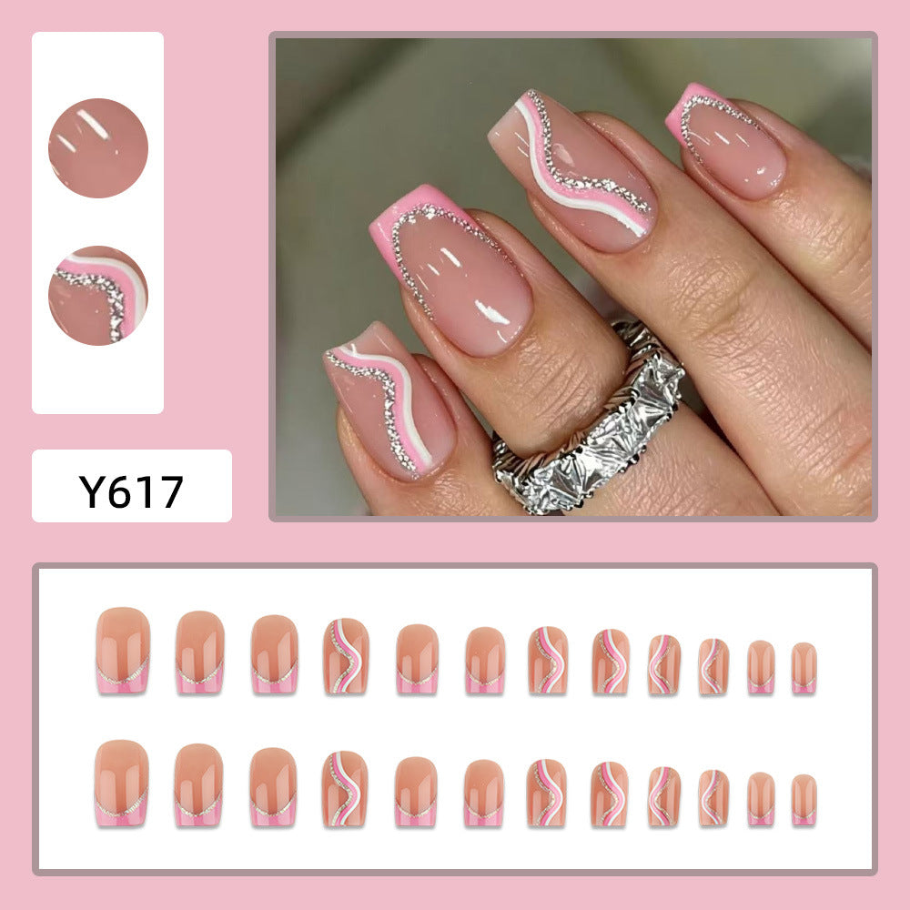 Artificial nails with elegant wave design and glitter accents Bowlift