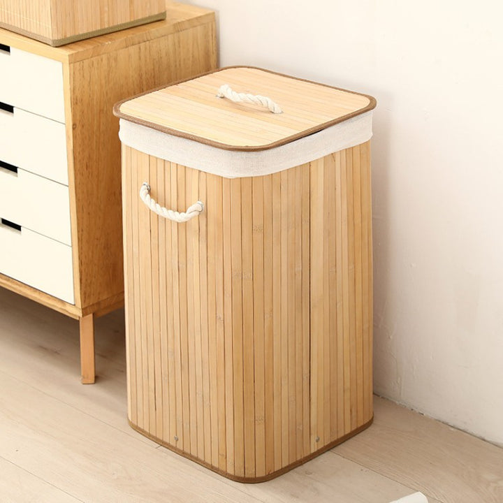 Laundry basket made of natural bamboo by Bowlift