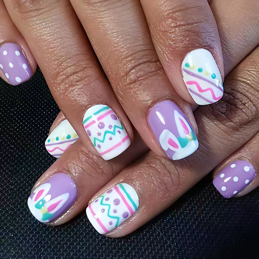 Artificial nails in creative Easter design Bowlift