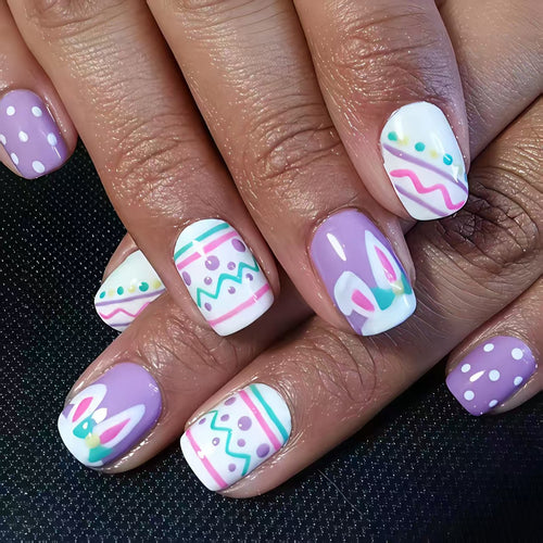 Artificial nails in creative Easter design Bowlift