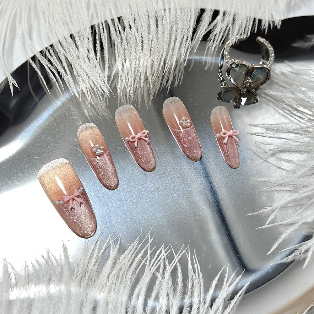 Elegant artificial nails with bows and pearl decoration Bowlift