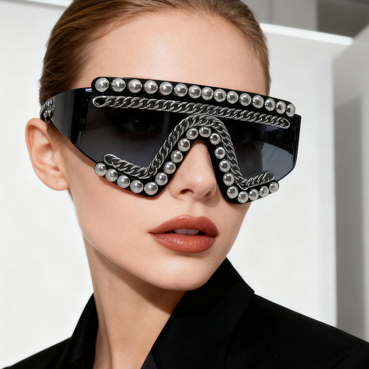 Women's fashion sunglasses with luxurious chain frame and shimmering accents Bowlift