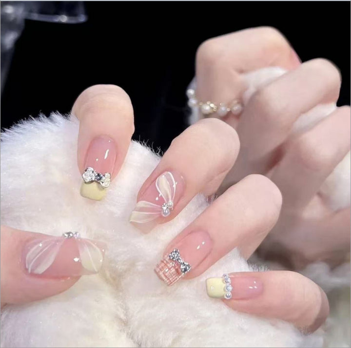 Artistic nail set with 3D flower and bow details Bowlift