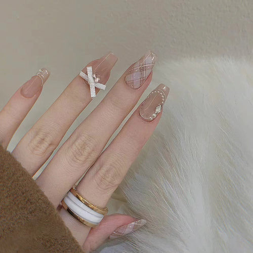 Elegant Press-On Nail Art Set with Ribbons and Gemstone Accents Bowlift