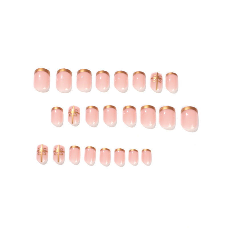 Elegant nail design with gold accents Bowlift