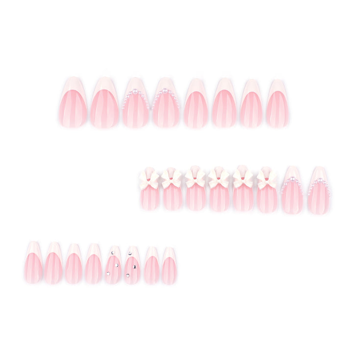 Artful stiletto nails with elegant flower embellishment Bowlift