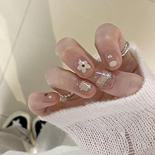 Artificial nails with elegant floral designs Bowlift